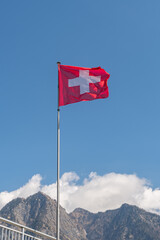 Waving swiss flag in Truebbach in Switzerland