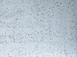 Lots of small black dots on a white background.