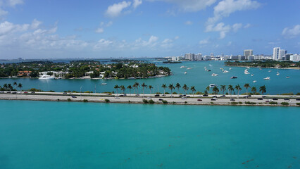Aerial view of waterfront residential and office buildings Biscayne Bay on sunny cloudless morning...