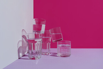 Various glasses filled with water, hydration or health concept