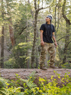 Indigenous young men hiking in nature