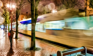 Portland Oregon commuter train speeding by at night long exposure