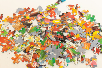 Fototapeta na wymiar Colorful puzzle pieces in a pile