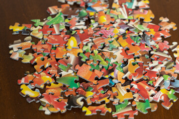 Pile of puzzle pieces on a table