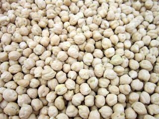         dried chickpea as background. Closeup uncooked chickpea top view Vegan healthy nutrition                                