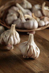 Garlic on an old wooden table.