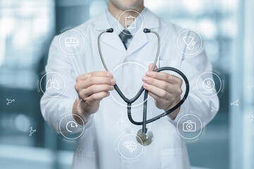 Doctor shows a stethoscope on the background of a virtual screen.