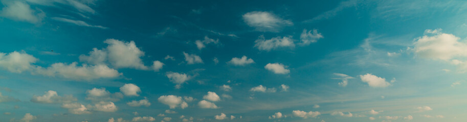 White wonderful clouds in blue panorama sky