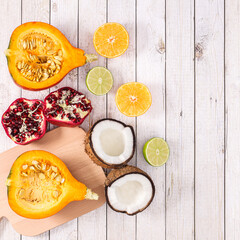 Creative arrangement of healthy fruits on wooden background. Flat lay