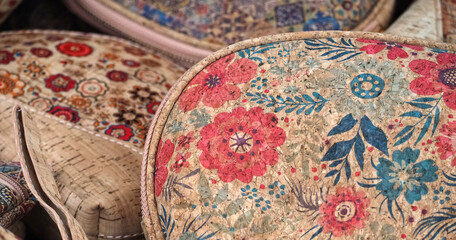 Cork bags souvenirs from Portugal in colorful designs by Quanzhou Tengkai on a market