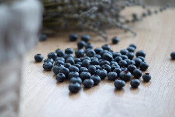 Blueberry isolated on wooden background