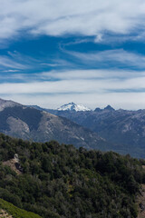 Amazing panoramic of a mountain and clouds in San Carlos de Bariloche, Argentina, Patagonia, South America. Vertical