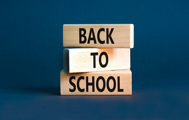 Back to school and support symbol. Concept words Back to school on wooden blocks. Beautiful grey table grey background. Business, educational Back to school concept. Copy space.