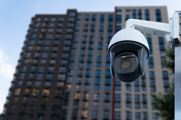 CCTV monitoring, security cameras. Backdrop with views of condominium
