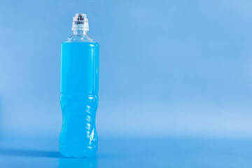 Blue bottled isotonic energy drink - hydrolyzed sport beverage. Body hydration, solves de-hydration...