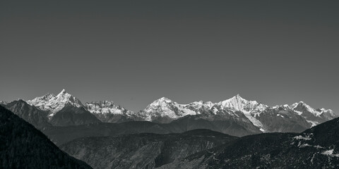 meili snow mountains in black and white