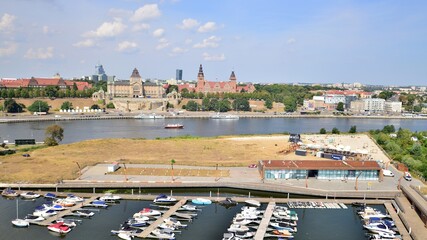 Fototapeta na wymiar Aerial view on city, port and river bank 