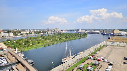 Aerial view on  city,  port and river bank  - obrazy, fototapety, plakaty