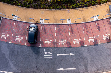 Aerial view directly above electric car charging facilities