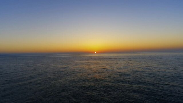 Fishing boat on sea at sunset. The shore of Kefken district of Kocaeli city Turkey. Aerial view