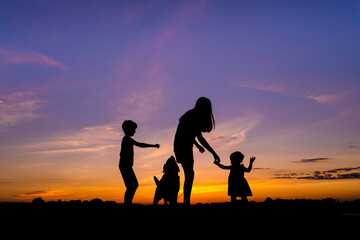 Fototapeta na wymiar silhouette of parent and child