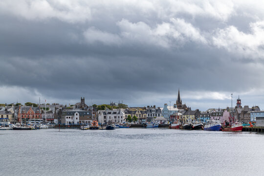18 August 2022. Stornoway, Isle of Lewis, Highlands and Islands, Scotland. This is a scene of Stornoway Harbour on an August morning as rain clouds started to break up.