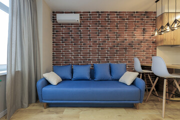 Blue sofa in a modern interior