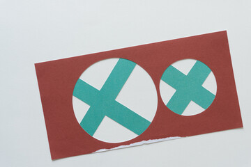paper frame with circles and X shapes