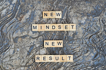 new mindset new result text on wooden square, inspiration and motivation quotes