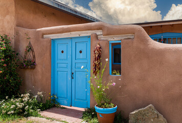 A Blue Door On Adobe Style Building In New Mexico