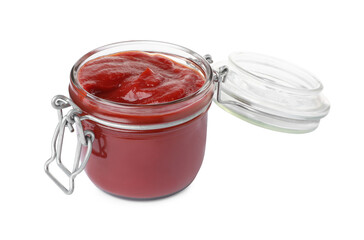 Tasty ketchup in glass jar isolated on white