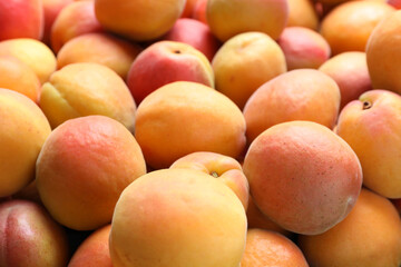 Delicious fresh ripe apricots as background, closeup