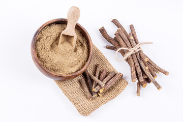 Licorice and licorice powder on the white background