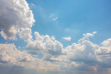 Fototapeta na wymiar Blue Sky with White Clouds up in the sky