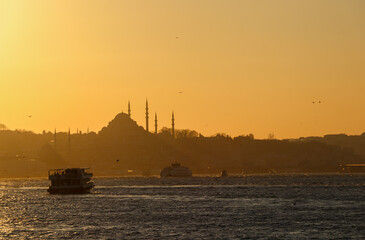 Istanbul - Turkey, Mosque silhouette in sea view at sunset