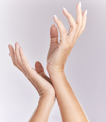 Soft, manicure hands or beauty treatment closeup of female model palms touching in elegant hand...