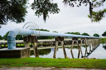 water pipeline above a canal or river