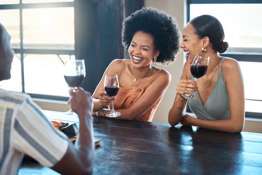 Friendship, Fun And Celebration With A Happy Group Bonding And Drinking Wine Together At A Restaurant. Diverse Friends Laughing, Getting Drunk And Carefree, Celebrating Good News And Freedom