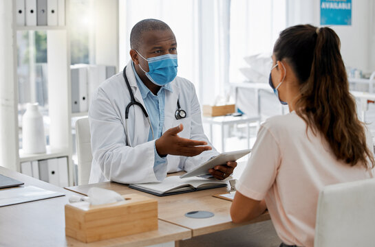 Doctors office, masks and sick patient consulting healthcare medic for covid virus test results at a hospital desk. Life insurance, people and medical employee giving woman support, help and service