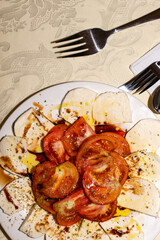 mozzarella and tomatoes on a dinner table 