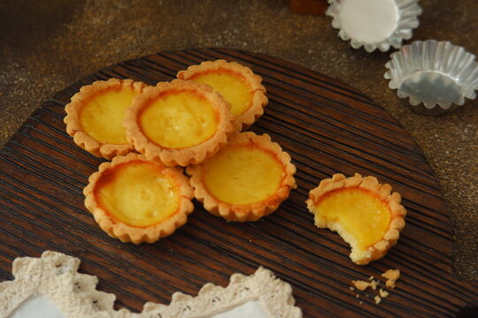 milk tarts on the wooden background 