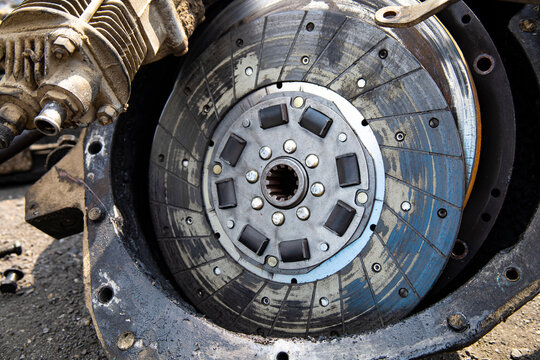The clutch disc from the tractor is close-up.