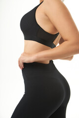 Fototapeta premium young slim woman posing in underwear and leggings. female back, buttocks. Concept beauty, body and skin care, medicine, health, spa, cosmetics,