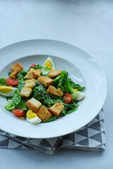 a plate of salad in white background