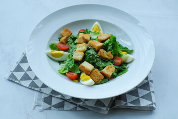 a plate of salad in white background