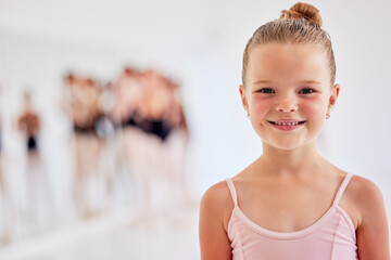 Little ballerina girl learning ballet dancing, art form and hobby in dance studio. Portrait of cute...
