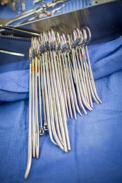 A group of hemostats in an operating room