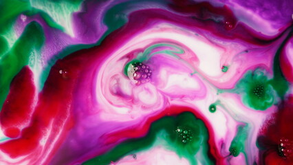 Abstract colors, backgrounds and textures. Oil coloring in milk creating bright colorful abstract backgrounds. Chemical experiment.