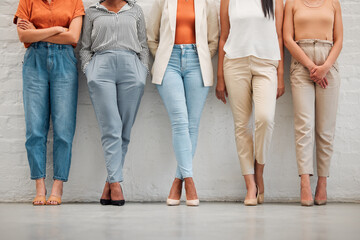 Trendy, fashionable and stylish women standing in a row for a design, marketing or stylist job...