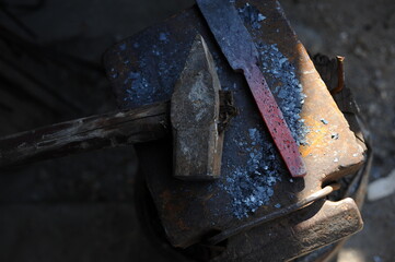 Almaty, Kazakhstan - 09.24.2015 : Various blacksmith's tools on a wooden stand in the workshop